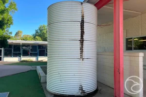 repairing damaged section of water tank
