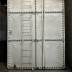 grp water tank showing signs of wear and damage